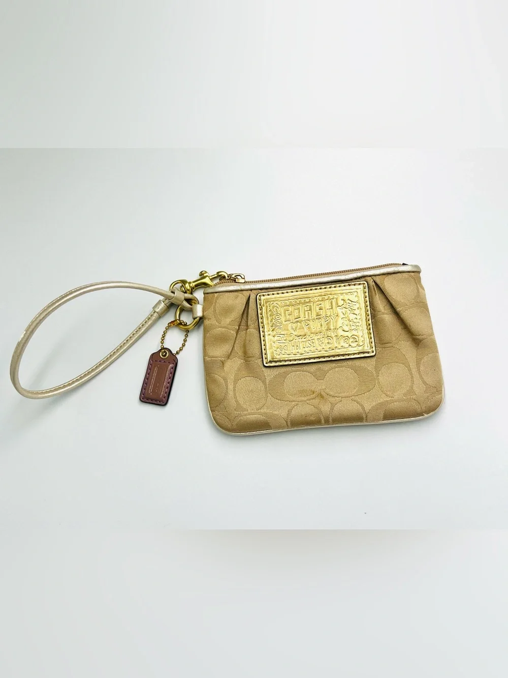 Coach Poppy Signature Wristlet